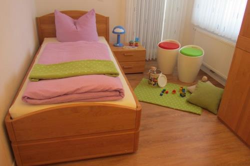 Langeoog Ferienhaus Strandvilla An´t Dünen - Haus 1 - Schlafzimmer, 2 Einzelbetten im OG