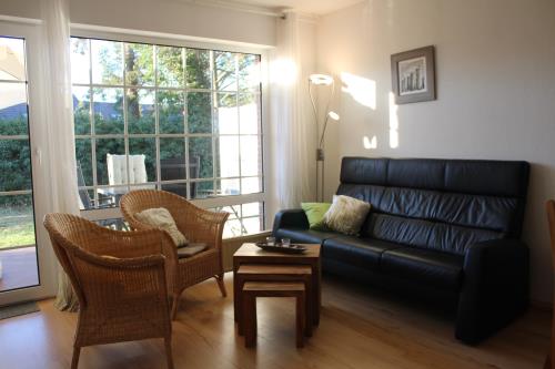 Langeoog Uns Huus Ferienwohnung Sonnenschein - Wohnzimmer