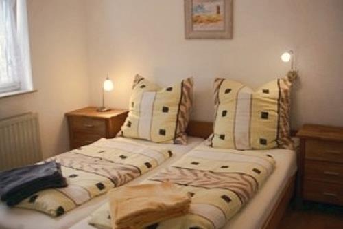 Langeoog Uns Huus Ferienwohnung Sonnenschein - Schlafzimmer I