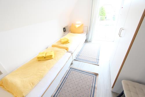 Langeoog Ferienwohnung Us Langeoog - Am Wall - Fewo Clas OG - Ferienwohnung Clas / OG 2. Schlafzimmer