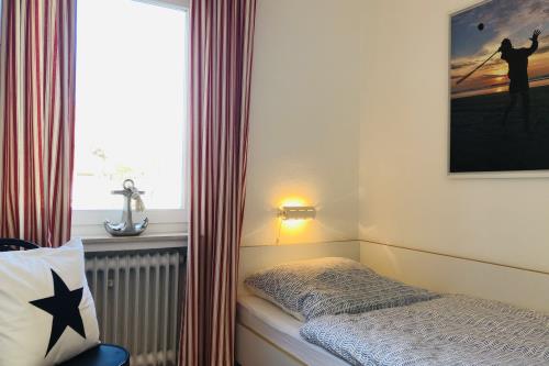 Langeoog Ferienwohnung Us Langeoog - Am Wall - Fewo Nele EG - Ferienwohnung Nele / EG Schlafzimmer 2