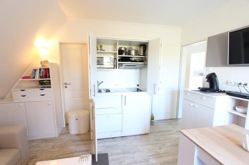 Langeoog Ferienwohnung Us Langeoog - Twee Strandloopers - Wohnbereich mit Pantry