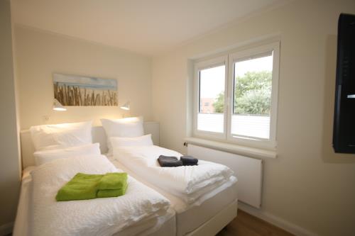 Langeoog Ferienwohnung Us Langeoog - Barkhausenstraße - 2te Heimat - 2te Heimat Schlafzimmer