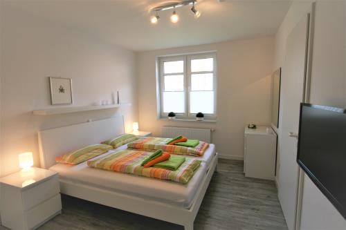 Langeoog Ferienwohnung Us Langeoog - Rudolf-Eucken-Weg - Schöne Aussicht - Schöne Aussicht Schlafzimmer