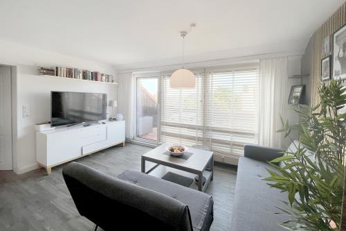 Langeoog Ferienwohnung Us Langeoog - Sonnendeck - Sonnendeck Wohnzimmer 05