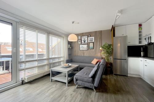 Langeoog Ferienwohnung Us Langeoog - Sonnendeck - Sonnendeck Wohnzimmer 01