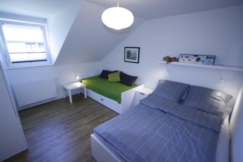 Langeoog Ferienhaus Us Langeoog - Haus Karla - Schlafzimmer