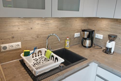 Langeoog Ferienhaus Captain&#39;s Langeoog - EG: Küchen-Aktivitäten mit Stereo