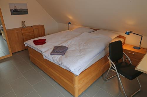 Langeoog Ferienhaus Captain&#39;s Langeoog - 1. OG Doppelzimmer, King Size