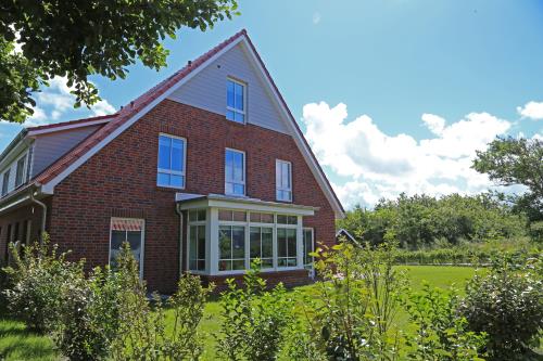 Langeoog Ferienhaus Captain&#39;s Langeoog - Blick auf die Nachbardünen