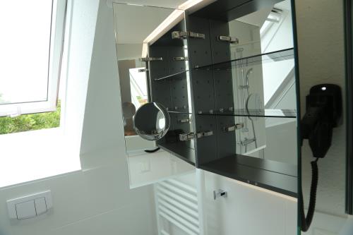 Langeoog Ferienhaus Captain&#39;s Langeoog - 2. OG: Spiegelgalerie