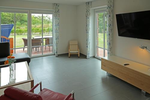 Langeoog Ferienhaus Captain&#39;s Langeoog - EG: Fernseh-Blick in die Natur