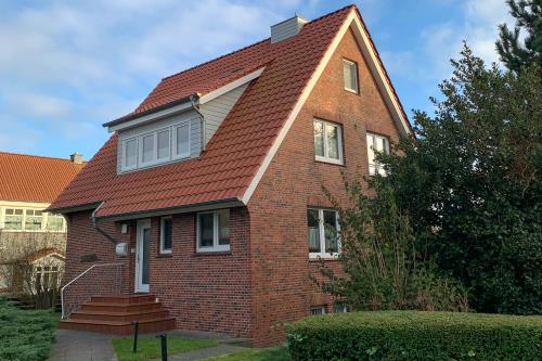 Langeoog Ferienwohnung Deck 2 - Haus Vorder schraeg