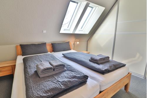 Langeoog Ferienwohnung Dünenschatz - Schlafzimmer 1