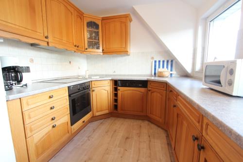 Langeoog Ferienhaus Us Langeoog - Kapteinshus - Brigg - OG - Ausstattung 10