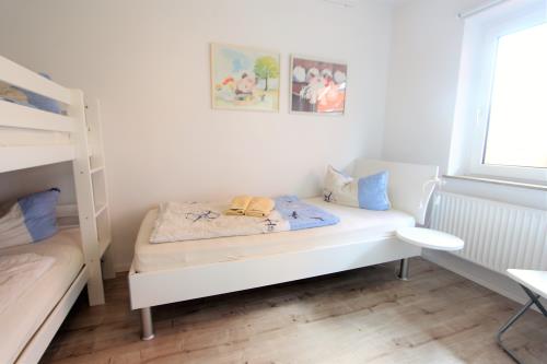 Langeoog Ferienhaus Us Langeoog - Kapteinshus - Klipper - EG - Ausstattung 4