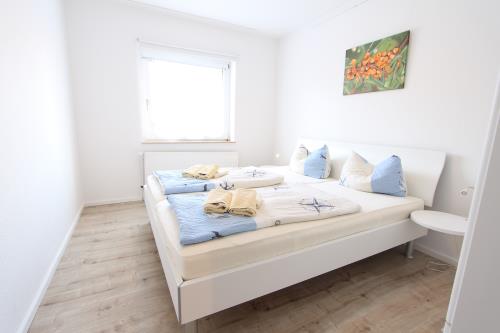 Langeoog Ferienhaus Us Langeoog - Kapteinshus - Klipper - EG - Ausstattung 9