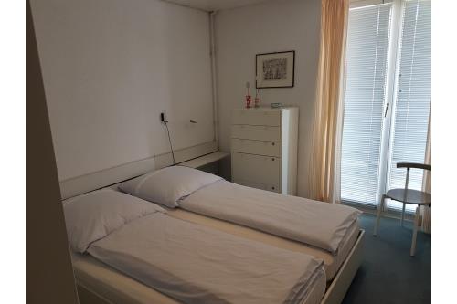 Langeoog Ferienhaus Schäfer - Schlafzimmer mit Doppelbett