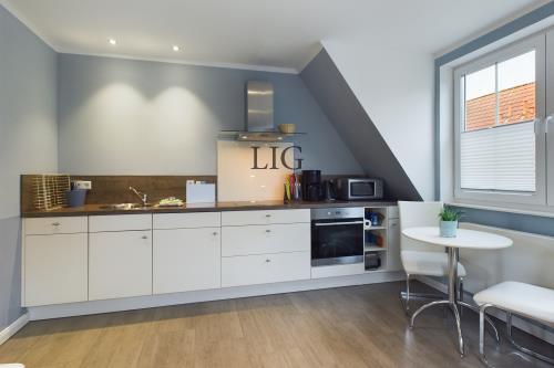 Langeoog Ferienwohnung De Draken Hus - CAM04236G0 PR0008 STILL011   3