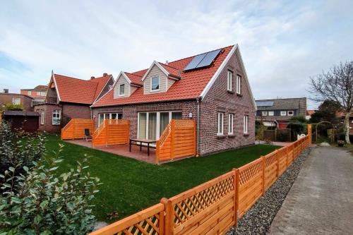 Langeoog Ferienhaus Große Freiheit Langeoog ***** - Außen Ansicht Terrassen