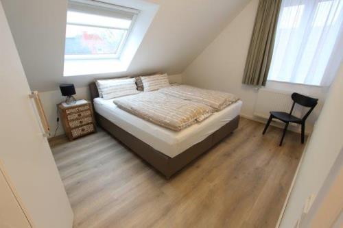 Langeoog Ferienhaus Große Freiheit Langeoog ***** - Ost - Schlafzimmer 1
