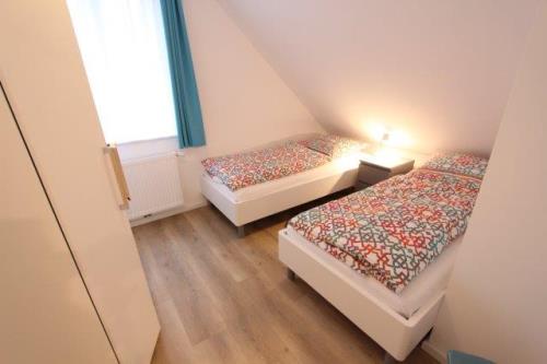 Langeoog Ferienhaus Große Freiheit Langeoog ***** - Ost - Schlafzimmer 2