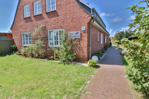 Langeoog Ferienwohnung Vermietung am Meer – Haus Dünenblume - Haus Dünenblume