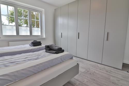 Langeoog Ferienwohnung Vermietung am Meer – Haus Dünenblume - Haus Dünenblume - Wohnung 1 - Schlafzimmer 1