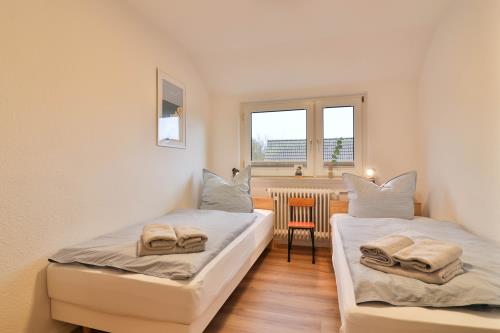 Langeoog Ferienwohnung Vermietung am Meer – Haus Seedüvel - Seedüvel OG - Schlafzimmer 2