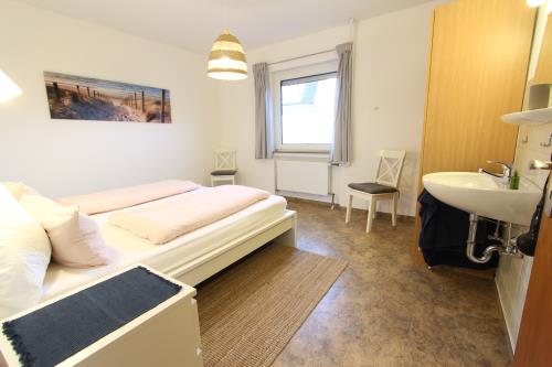 Langeoog Ferienhaus Us Langeoog - Rosenhuus - Ausstattung 8