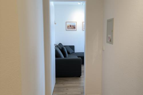 Langeoog Ferienwohnung Wind und Meer - Flur zum Wohnzimmer