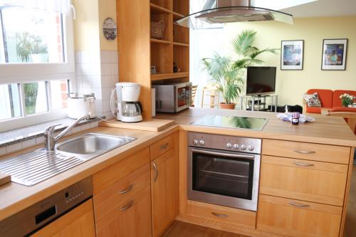 Spiekeroog Ferienwohnung Admiral - Wintergarten - offene Buchenküche