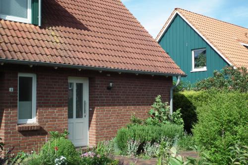 Spiekeroog Ferienwohnung Ankerplatz - Eingang Fewo(rechts)