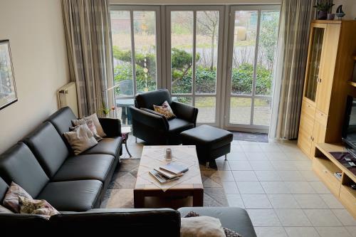 Spiekeroog Ferienhaus Austernfischer II, Wohnung 3 - Wohnzimmer