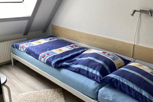 Spiekeroog Ferienhaus Austernfischer II, Wohnung 3 - Kinderzimmer