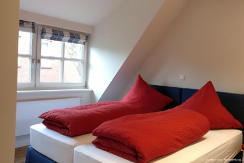 Spiekeroog Ferienwohnung Dünenrose - Schlafzimmer 1
