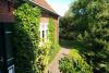 Spiekeroog Ferienwohnung Efeuhaus - Garten und Eingang zu Wohnung 2.