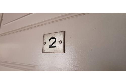Spiekeroog Ferienwohnung Efeuhaus - Türschild aus Pensionszeiten.