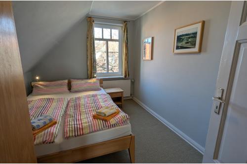 Spiekeroog Ferienwohnung Efeuhaus - Wohnung 1 - Wohnung 1 Zimmer Richtung Osten