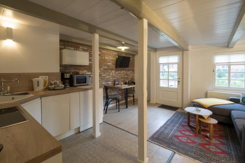 Spiekeroog Ferienwohnung Fam. Hönig - Mitte - Wohnzimmer und Eingang