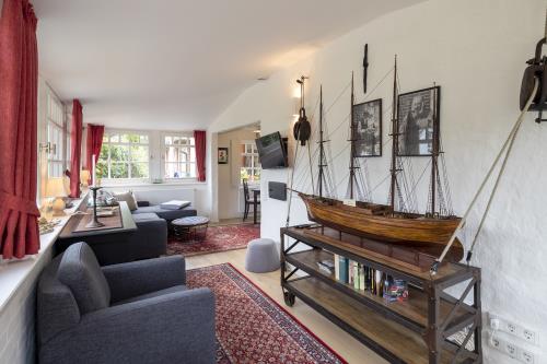 Spiekeroog Ferienwohnung Fam. Hönig - Süd - Eingang und Wohnzimmer