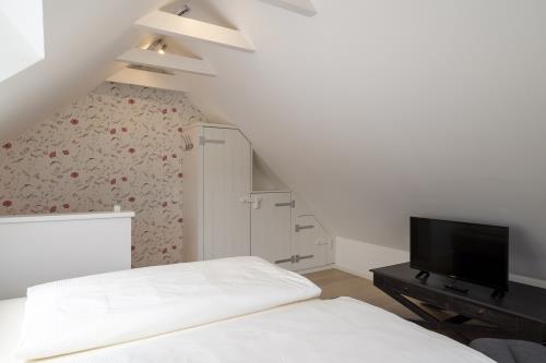Spiekeroog Ferienwohnung Fam. Hönig - Süd - Schlafzimmer 1. OG