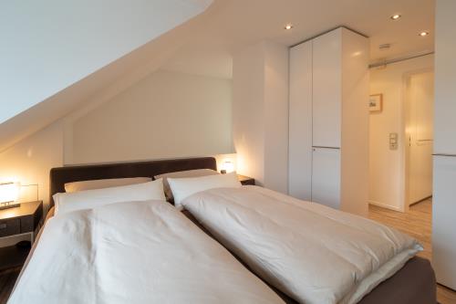 Spiekeroog Ferienhaus Inselperle - OG: 1. Schlafzimmer (Doppelbett 160x200)