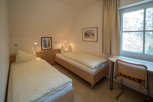 Spiekeroog Ferienwohnung Haus Bi d&#39; Utkiek 20 - Ost - Schlafzimmer