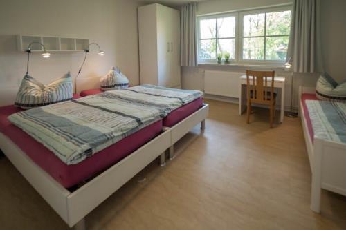 Spiekeroog Ferienwohnung Haus Bi d&#39; Utkiek 20 - Süd - Schlafzimmer 1