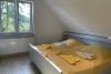 Spiekeroog Ferienhaus Haus Deichblick - Schlafen Doppelbett