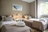 Spiekeroog Ferienhaus Inselkiefer - Schlafzimmer mit Einzelbetten