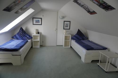 Spiekeroog Ferienwohnung Haus Krönchen Whg. 8 - Schlafen im Dachgeschoss