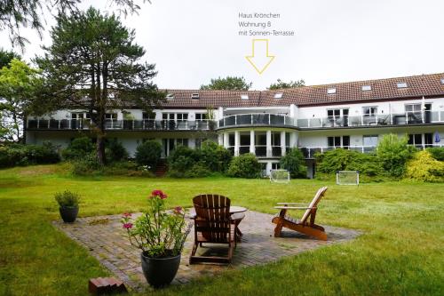 Spiekeroog Ferienwohnung Haus Krönchen Whg. 8 - großer Garten -Sitzplatz, Sandkiste-