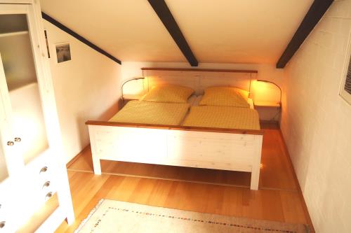 Spiekeroog Ferienhaus Haus Nordlicht - Schlafzimmer 1